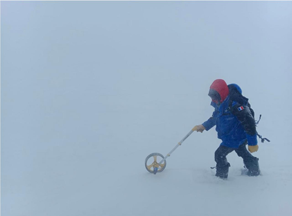 Figure 2: Conducting a topographic survey of the surface using a topographic wheel under blizzard conditions. Figure 2: Conducting a topographic survey of the surface using a topographic wheel under blizzard conditions.